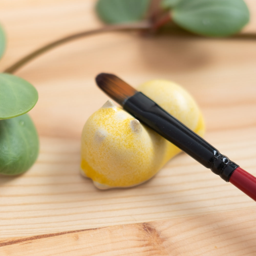 Chopstick rest - Cat, glazed sunshine yellow