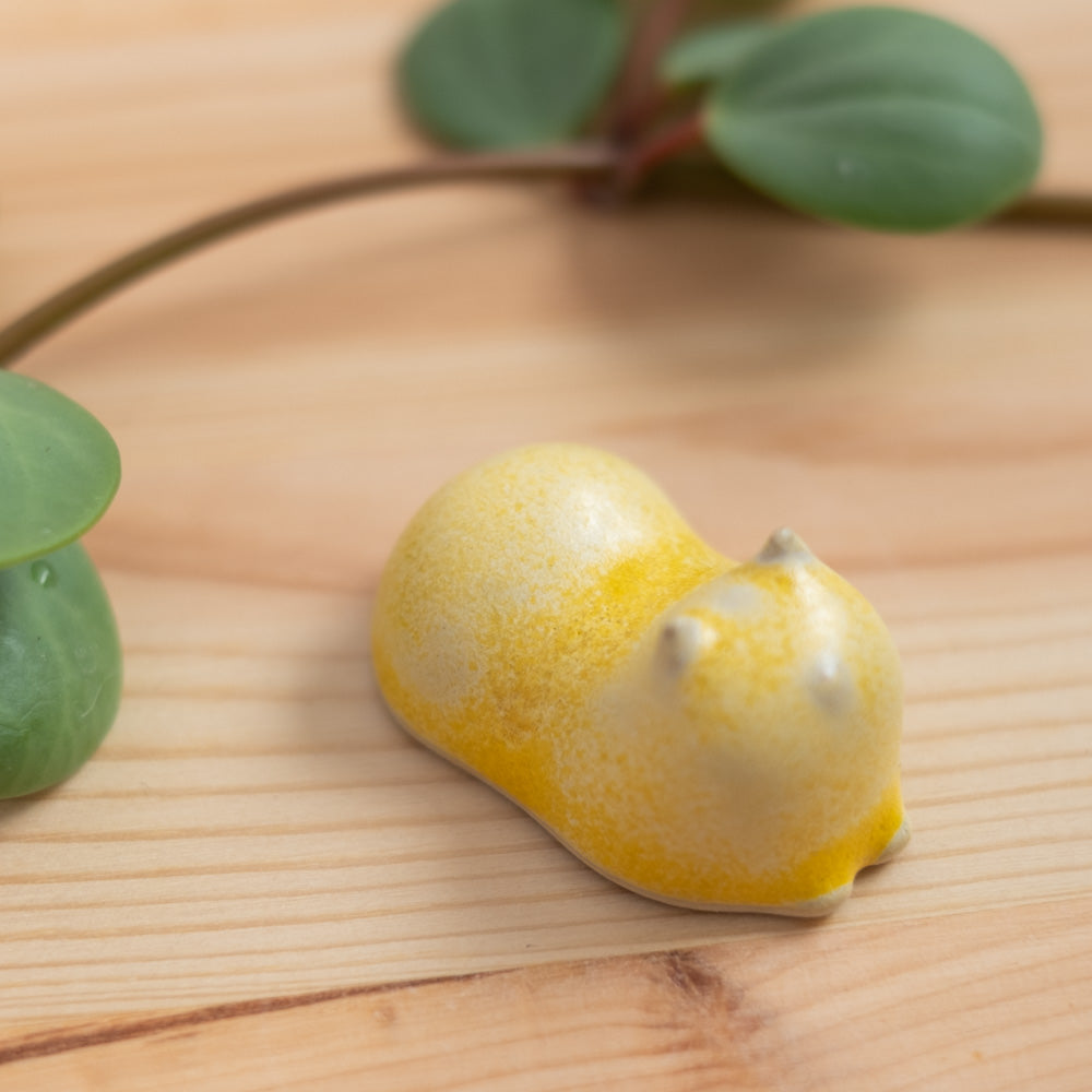 Chopstick rest - Cat, glazed sunshine yellow