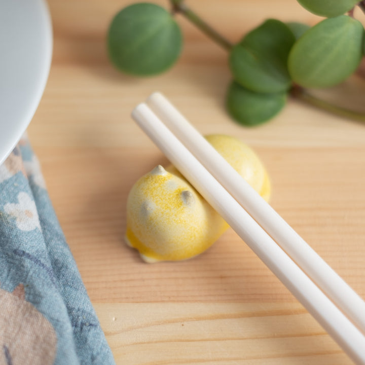 Chopstick rest - Cat, glazed sunshine yellow